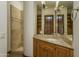 Spa-like bathroom with double vanity and a walk-in shower at 7150 N 64Th Pl, Paradise Valley, AZ 85253