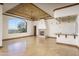 Grand game room with fireplace and access to outdoor area at 7150 N 64Th Pl, Paradise Valley, AZ 85253