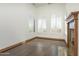 Bright office space with hardwood floors and plantation shutters at 7150 N 64Th Pl, Paradise Valley, AZ 85253