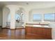 Wet bar with granite countertop and scenic views at 7150 N 64Th Pl, Paradise Valley, AZ 85253