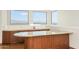 Wet bar with granite countertop and scenic view at 7150 N 64Th Pl, Paradise Valley, AZ 85253