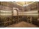 Custom-built wine cellar with ample storage for wine bottles at 7150 N 64Th Pl, Paradise Valley, AZ 85253