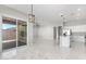 Open concept dining area with kitchen and living room views at 10176 W Heather Dr, Arizona City, AZ 85123