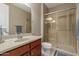 Bathroom with a large walk-in shower and updated vanity at 1113 W Fir Tree Rd, Queen Creek, AZ 85140