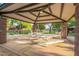 Relaxing gazebo with picnic tables for outdoor gatherings at 1113 W Fir Tree Rd, Queen Creek, AZ 85140