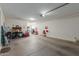 Spacious garage with overhead storage at 1113 W Fir Tree Rd, Queen Creek, AZ 85140