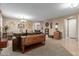 Bright and airy living room with ample natural light and comfortable seating at 1113 W Fir Tree Rd, Queen Creek, AZ 85140