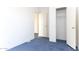 Bright bedroom featuring a closet and carpet at 12866 W Sun Ave, Eloy, AZ 85131