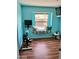 Bedroom showcasing a bright window seat and a stationary bike at 1424 E Kerry Ln, Phoenix, AZ 85024