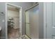 Bathroom with a walk-in shower and linen closet at 14416 W Kiowa Trl, Surprise, AZ 85374