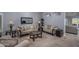 Elegant living room boasts plush sofas and a large mirror at 14416 W Kiowa Trl, Surprise, AZ 85374