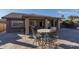 Patio with seating area and view of backyard at 14416 W Kiowa Trl, Surprise, AZ 85374