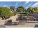 Patio with seating area and view of the surrounding landscape at 14416 W Kiowa Trl, Surprise, AZ 85374