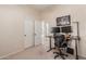 Home office with a sit-stand desk and two monitors at 1671 W Crescent Way, Chandler, AZ 85248