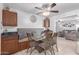 Built-in dining bench with glass-top table in kitchen at 1716 N Longmore St, Chandler, AZ 85224