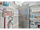 Well-organized pantry with ample shelving for storage at 17255 W Seldon Ln, Waddell, AZ 85355