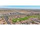 Aerial view of community near highway with golf course and desert at 22728 N Arrellaga Dr, Sun City West, AZ 85375