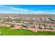 Aerial view of a community with houses and a golf course at 22728 N Arrellaga Dr, Sun City West, AZ 85375