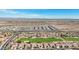Aerial view showing neighborhood by golf course and highway at 22728 N Arrellaga Dr, Sun City West, AZ 85375