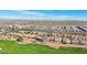 Aerial view of neighborhood near golf course and highway at 22728 N Arrellaga Dr, Sun City West, AZ 85375