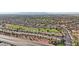 Aerial view of neighborhood near a golf course and highway at 22728 N Arrellaga Dr, Sun City West, AZ 85375