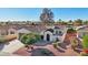 Single-story home with tile roof, and a two car garage, in a community setting at 22728 N Arrellaga Dr, Sun City West, AZ 85375