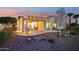 Well-maintained backyard with a covered patio and grill at 22728 N Arrellaga Dr, Sun City West, AZ 85375
