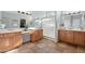 Bathroom features double sinks, wood cabinets and a large shower at 22728 N Arrellaga Dr, Sun City West, AZ 85375