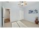 Bright bedroom with neutral walls and carpet flooring at 22728 N Arrellaga Dr, Sun City West, AZ 85375