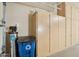 Garage with additional storage and water softener system at 22728 N Arrellaga Dr, Sun City West, AZ 85375