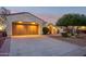 Two-car garage with light colored doors at 22728 N Arrellaga Dr, Sun City West, AZ 85375