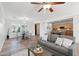 Open living room and kitchen, featuring comfortable seating at 22728 N Arrellaga Dr, Sun City West, AZ 85375
