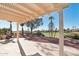Covered patio overlooks a golf course with pergola and seating at 22728 N Arrellaga Dr, Sun City West, AZ 85375