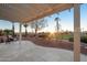 Relaxing patio with pergola, offering scenic golf course views at 22728 N Arrellaga Dr, Sun City West, AZ 85375