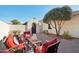 Relaxing patio with comfortable seating and brick pavers at 22728 N Arrellaga Dr, Sun City West, AZ 85375