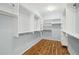 Large walk-in closet with ample shelving and hanging space at 22728 N Arrellaga Dr, Sun City West, AZ 85375
