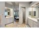 Elegant bathroom with dual vanities and a large mirror at 25341 N 113Th Way, Scottsdale, AZ 85255