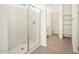 Modern bathroom featuring a glass-enclosed shower and convenient access to other rooms at 2685 E Santa Ynez Dr, Casa Grande, AZ 85194