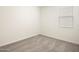 Clean, empty bedroom featuring neutral carpet and a single window providing natural light at 2685 E Santa Ynez Dr, Casa Grande, AZ 85194