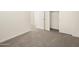Empty bedroom featuring gray carpet and a closet, ready for personalization at 2685 E Santa Ynez Dr, Casa Grande, AZ 85194