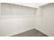 Spacious walk-in closet with carpeted floors and white walls and shelving at 2685 E Santa Ynez Dr, Casa Grande, AZ 85194