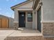 Welcoming front entrance with stone pillars and a dark-colored front door at 2685 E Santa Ynez Dr, Casa Grande, AZ 85194
