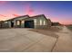 Charming single-story home with a two-car garage and stone accents on the facade at 2685 E Santa Ynez Dr, Casa Grande, AZ 85194