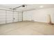 Spacious two-car garage with ample storage space and new garage door at 2685 E Santa Ynez Dr, Casa Grande, AZ 85194