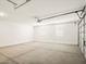 Spacious two-car garage with ample storage space and natural lighting at 2685 E Santa Ynez Dr, Casa Grande, AZ 85194
