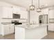 Bright kitchen with a large island, stainless steel appliances and granite countertops at 2685 E Santa Ynez Dr, Casa Grande, AZ 85194