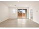 Bright living room features tile flooring, recessed lighting, and sliding glass doors at 2685 E Santa Ynez Dr, Casa Grande, AZ 85194