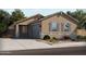 Single-story home with a two-car garage and landscaping at 2695 E Santa Ynez Dr, Casa Grande, AZ 85194