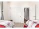 Cozy bedroom with two twin beds and access to hallway at 29715 N 119Th Ln, Peoria, AZ 85383