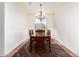 Formal dining room with wood table and chandelier at 29715 N 119Th Ln, Peoria, AZ 85383